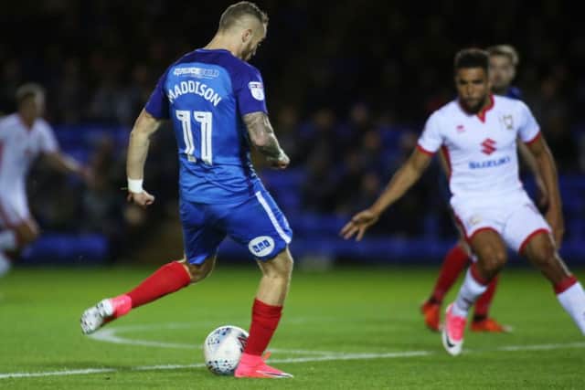 Marcus Maddison scores for Posh against MK Dons. Photo: Joe Dent/theposh.com.