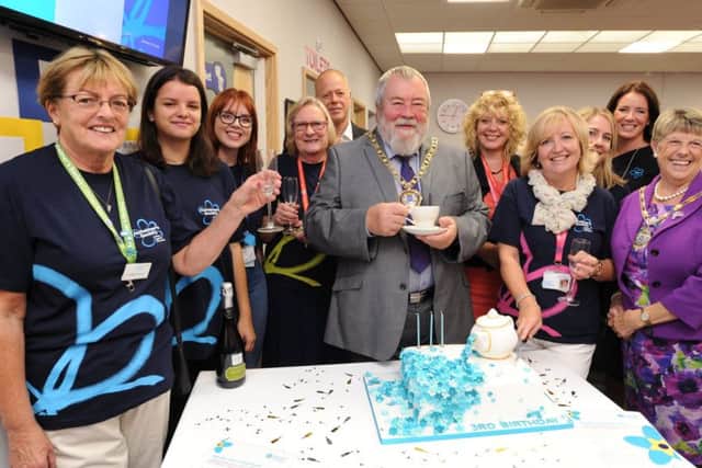 Mayor of Peterborough Coun. John Fox and Mayoress Judy Fox with volunteers at the 3rd birthday celebrations at the Dementia Resource Centre at  York Road EMN-170809-144500009