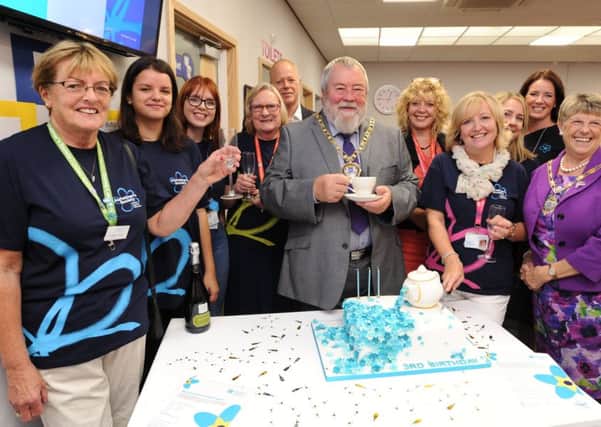 Mayor of Peterborough Coun. John Fox and Mayoress Judy Fox with volunteers at the 3rd birthday celebrations at the Dementia Resource Centre at  York Road EMN-170809-144500009