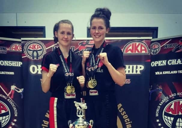 Bethany Jones and Rebecca Jones with their trophy haul from the WKA Open.