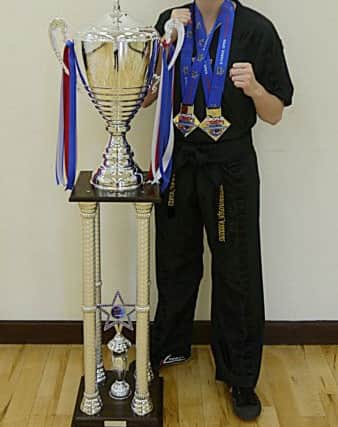 Lianne Jones with her trophies from the G Force International Open.