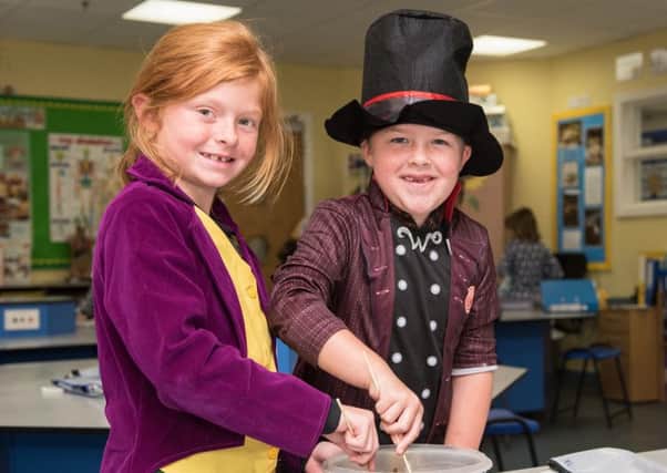 Pupils dressed as Willy Wonka and Fantastic Mr Fox at Roald Dahl Day at Laxton  Junior School