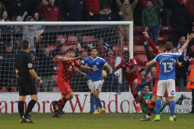 Heartbreak for Posh at Walsall last season as the home side take the lead in injury time.