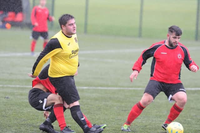 Netherton B (red) and Ramsey Reserves during their drawn match. Photo: David Lowndes.