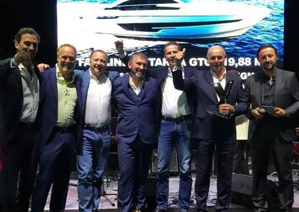 Award winners, from left,  Alberto Mancini, Karl Gilding, Andrey Lomakin, Alexander Volov, Igor Glyanenko and Russell Currie accepting the award at the World Yachts Trophies 2017 awards ceremony.