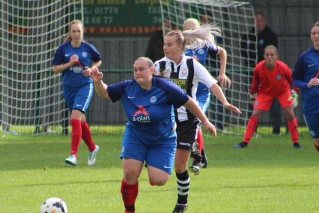 Tash Applegate is on the ball for Posh against Star. Picture: Gary Reed