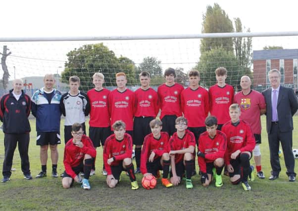Pinchbeck Under 16s are pictured in new kit sponsored by the Field House Residential Home in Eye ahead of their Lincolnshire County Cup game against Marshalls. The match was abandoned due to bad weather with the score at 2-2. From the left are, back, Martin Johnson (coach), Chris Ward (assistant  coach), Jordan Johnson, Sam Ridgway, Ben Smith, Joe Briggs, George Craig, Lee Addison, Stefan Stoleru, Dave Smith (assistant coach), Paul Dempsey (Field House representative), front, Ben Mansfield, Tom Thorold, Luca Ward, Michael McGowan, Joe Bull and David Borowski.