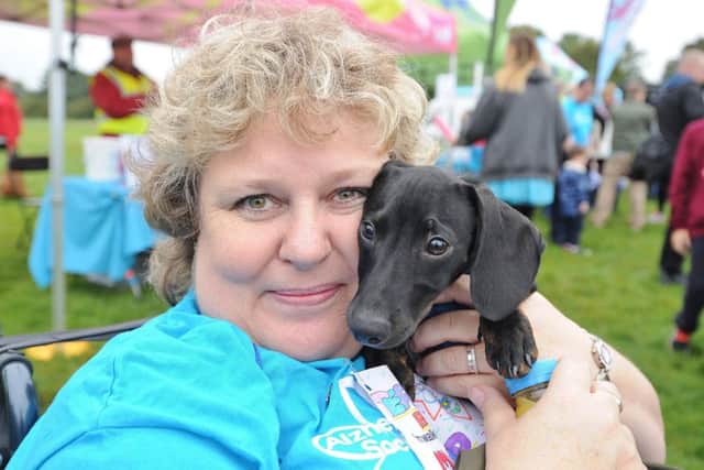 Alzheimers Memory Walk at Ferry Meadows . Cheryl Leigh with her puppy Dobby. EMN-170917-150145009