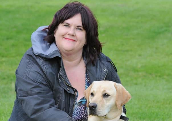 Sue Tubbs and Guide Dog puppy Sparky from Whittlesey. EMN-170918-163757009