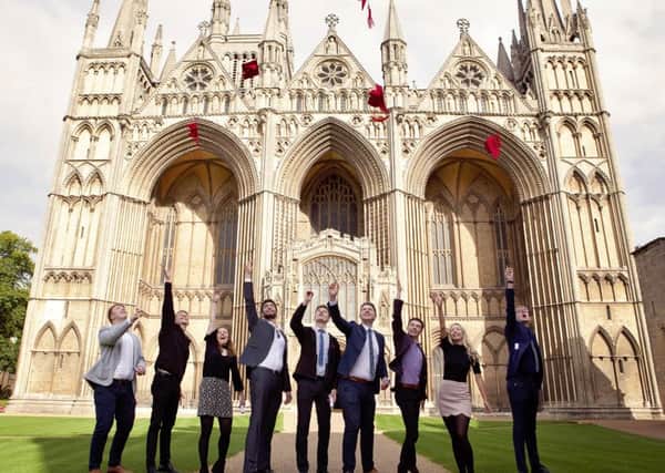 CCEP's apprentices celebrate their graduation at Peterborough Cathedral.