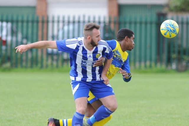 Jordan Fiddes (left) scored for Peterborough Sports Reserves against ICA Sports.