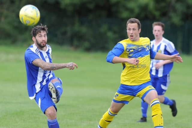Tom Flatters (left) scored for Peterborough Sports Reserves against ICA Sports.