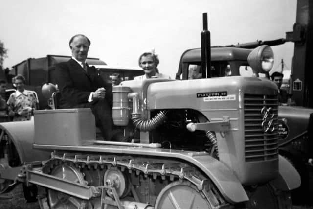 Frank Perkins and wife on tractor in 1953 21st birthday of Perkins engines