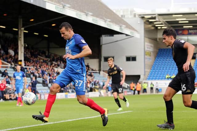 Lovely ball control from Posh centre-back Steven Taylor in the game against Wigan. Photo: Joe Dent/theposh.com.