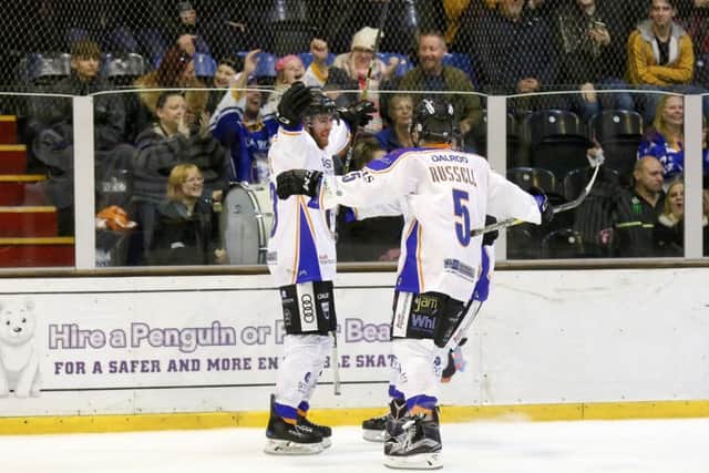 Phantoms' man of the match James White celebrates his goal against Streatham with team-mates. Photo: Tom Scott - AMOimages.com.