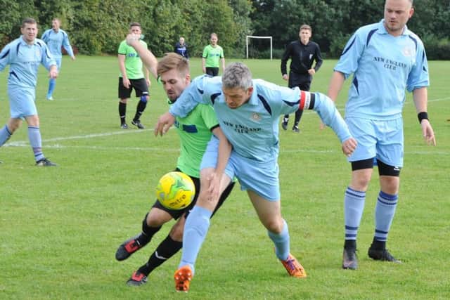 Action from the Peterborough Division Four clash between NECI and Holbeach United A. Photo: David Lowndes.