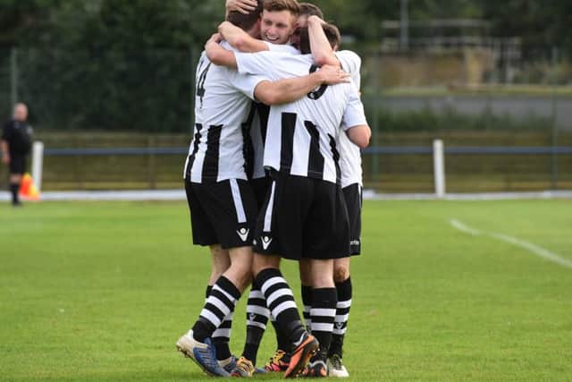 Peterborough Northern Star players celebrate an FA Vase victory at Potton at the weekend. Photo: Chantelle McDonald. @cmcdphotos.