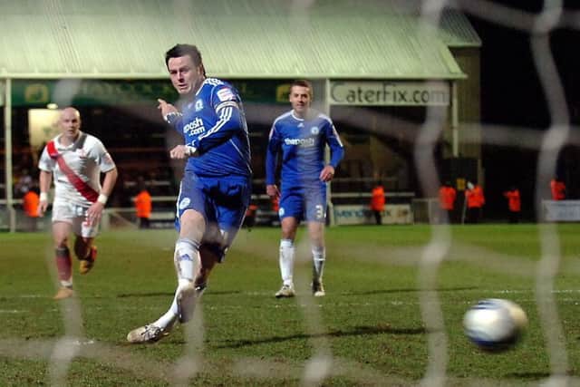 Lee Tomlin converts a 90th minute penalty for Posh against Southampton to claim a point from a 4-4 draw.