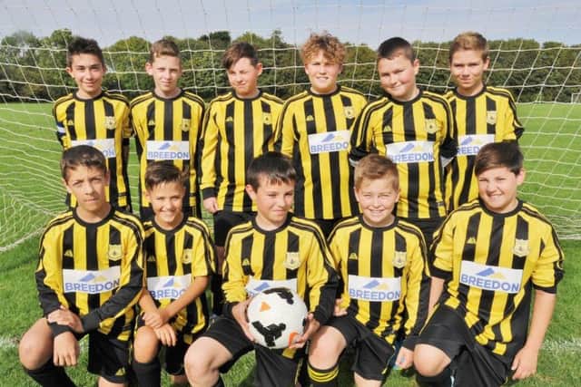 Crowland Under 13s are pictured before a 4-2 defeat by Parkside in Division Four of the Peterborough Junior Alliance League. They are from the left, back, Troy Harrison, Peter Burdett, Rhys Copland, Dylan Camfield, Joey Turner, Taylor Moulding, front, Craig Al-Rousi, Max Allen, Ryan Fisher, Reece Pridmore and Josh Hall.