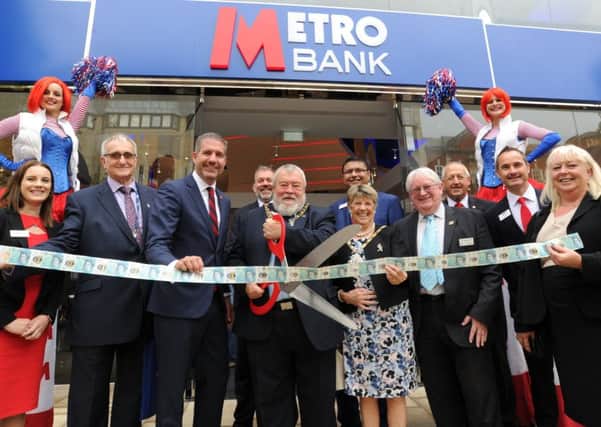 The official oening of the Metro Bank by the Mayor of Peterborough Cllr John Fox, with from left, Cllr John Holdich, Iain Kirkpatrick , Mayoress Cllr Judy Fox and Iain Crighton.