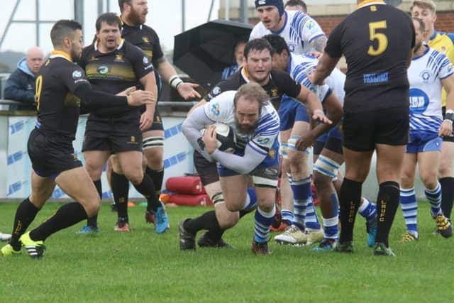 Wes Cope drives forward for the Lions against Longton. Picture: Mick Sutterby