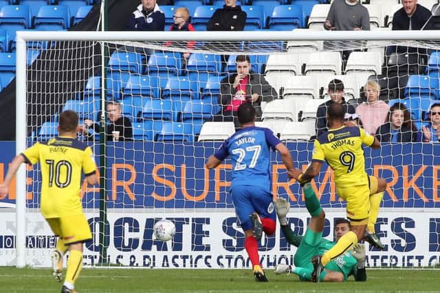 Wes Thomas fires Oxford in front at Posh. Photo: Joe Dent/theposh.com.