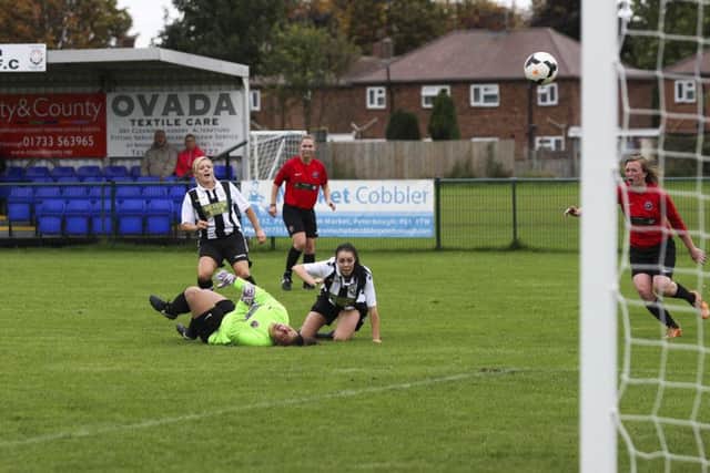Cassie Steward scores the first of her three goals.