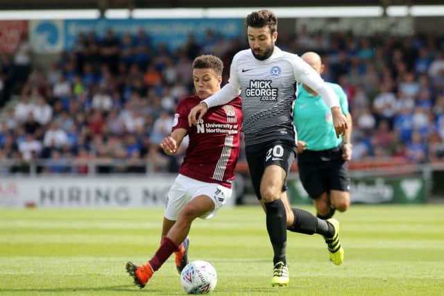 Posh midfielder Michael Doughty in action at Northampton earlier this season.