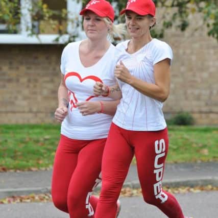 Great Eastern Runners  Sammy Darling and  Abi Luker running in memory of  Ben and Francis Devonshire EMN-170210-183648009