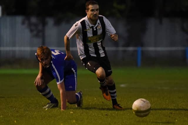 Matt Barber (stripes) in action for Peterborough Northern Star against Boston Town. Photo: Chantelle McDonald. @cmcdphotos.