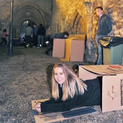 YMCA Sleep Easy  at the Peterborough Cathedral cloisters. Megan Grinney in her box EMN-170930-180628009