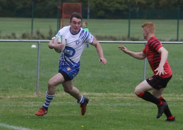 Rory Whites races in for the first of his two tries. Picture: Mick Sutterby