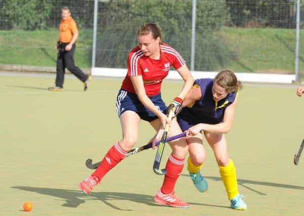 Action from City of Peterborough Ladies' (red) 5-2 win over Maidstone. Photo: David Lowndes.