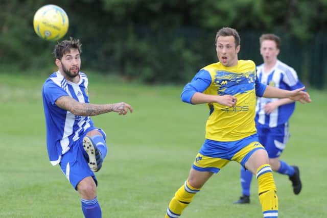 Tom Flatters (left) scored for Peterborough Sports Reserves at Sawtry.