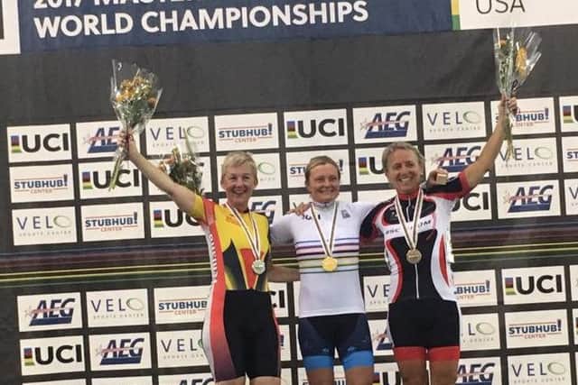 Lindsay Clarke (left) on the podium at the World Masters Championships in California.