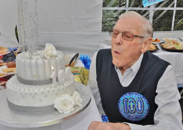100-year-old Henry Jeffery at a street party to mark his birthday. EMN-171014-175920009