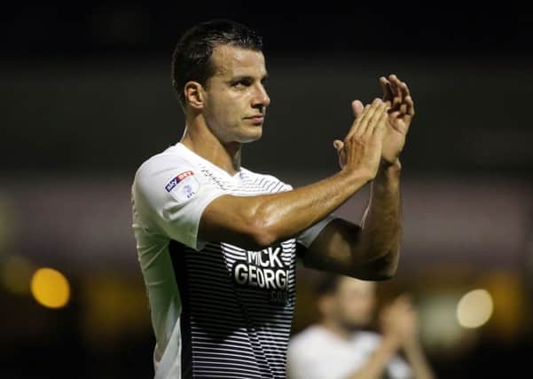 Posh defender Steven Taylor applauds the visiting fans after the draw at Southend. Photo: Joe Dent/theposh.com.