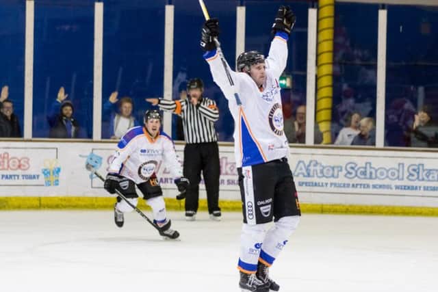 Phantoms' star Leigh Jamieson celebrates his winning goal in overtime against Swindon. Â©2017 Thomas Scott. All rights reserved.