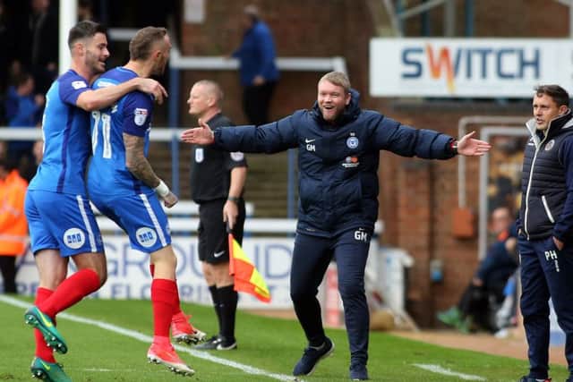 Marcus Maddison of Peterborough United celebrates scoring his goal with Peterborough United Manager Grant McCann - Mandatory by-line: Joe Dent/JMP - 28/10/2017 - FOOTBALL - ABAX Stadium - Peterborough, England - Peterborough United v Shrewsbury Town - Sky Bet League One