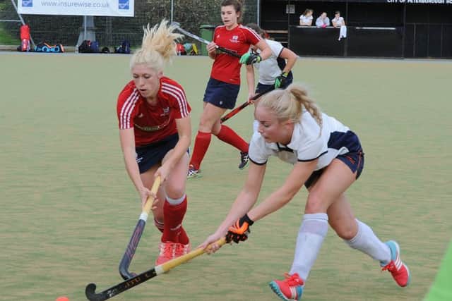 Action from City of Peterborough (red) v St Albans seconds. Photo: David Lowndes.