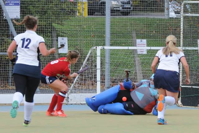 Action from a 4-0 win for City of Peterborouhgh Ladies (red) over St Albans seconds. Photo: David Lowndes.