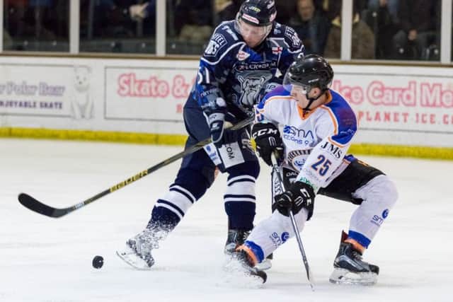Phantoms' Edward Knaggs (white) stops Sheffield's Ashley Calvert advancing with the puck. Â©2017 Thomas Scott. All rights reserved.