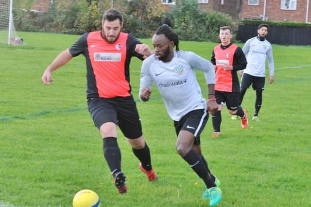 Action from FC Peterborough's 4-2 win over Parkway Eagles (red). Photo: David Lowndes.
