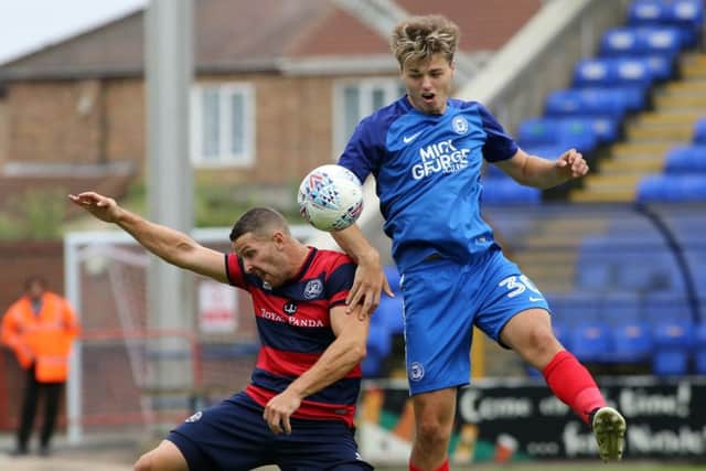 Young Posh centre-back Sam Cartwright in action for Posh in a first-team friendly.