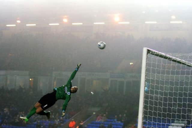 George Boyd's strike against Huddersfield flies over the goalkeeper into the net. Photo: David Lowndes.