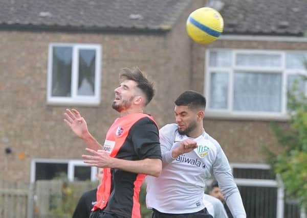 Action from FC Peterborough's win over Parkway Eagles (red) last weekend. Photo: David Lowndes.