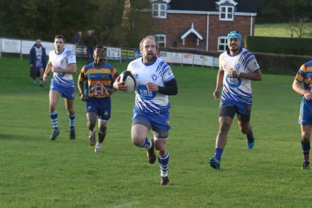 Wes Cope runs in for a try. Picture: Mick Sutterby