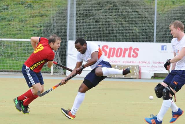 Joe Finding (red) in action for City of Peterborough against St Albans. Photo: David Lowndes.
