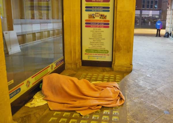 A rough sleeper in St Peter's Arcade last year