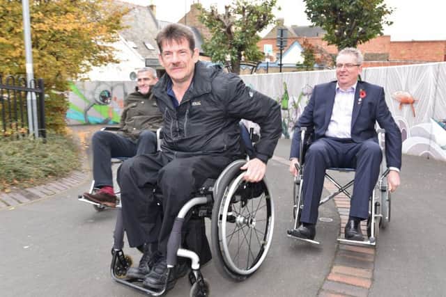 Wheelchairs in city centre feature -  Dave Wait, Barry Plumb and Mark Broadhead EMN-170211-132948009